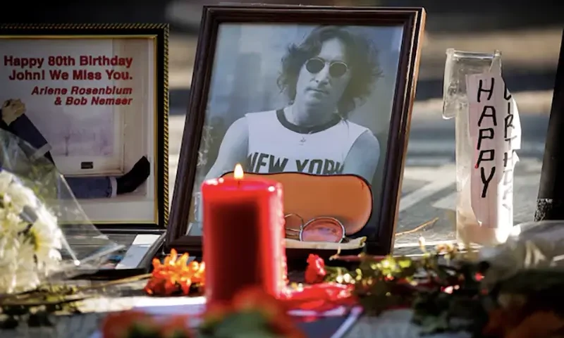 A memorial for late former Beatle John Lennon is seen at the "Imagine" mosaic in the Strawberry Fields section of Central Park to mark Lennon's 80th birthday, in New York City, U.S., October 9, 2020. REUTERS/Brendan McDermid/File Photo