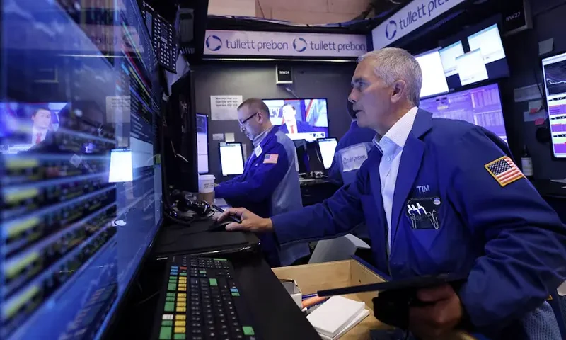 Traders work on the trading floor at the New York Stock Exchange (NYSE) in New York City, U.S., April 4, 2024. REUTERS/Andrew Kelly