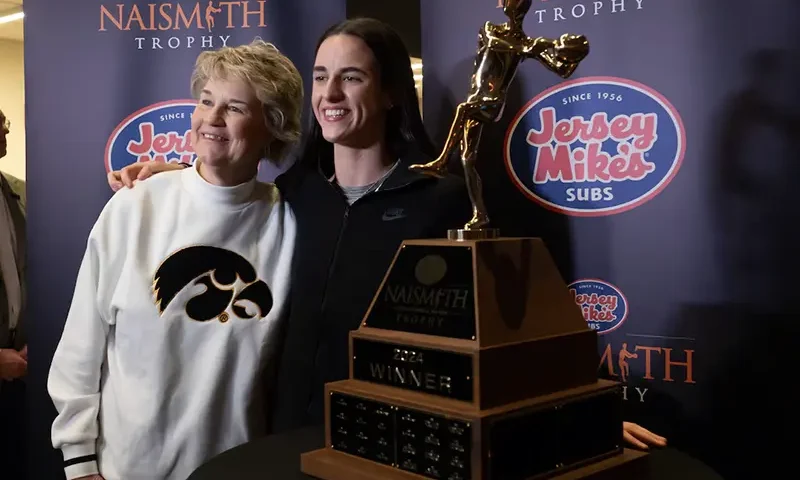 Caitlin Clark of Iowa poses for a photo with head coach Lisa Bluder after receiving the the award for Naismith Women’s Player of the Year at the Cleveland Browns Stadium Key Bank Club. Mandatory Credit: Ken Blaze-USA TODAY Sports