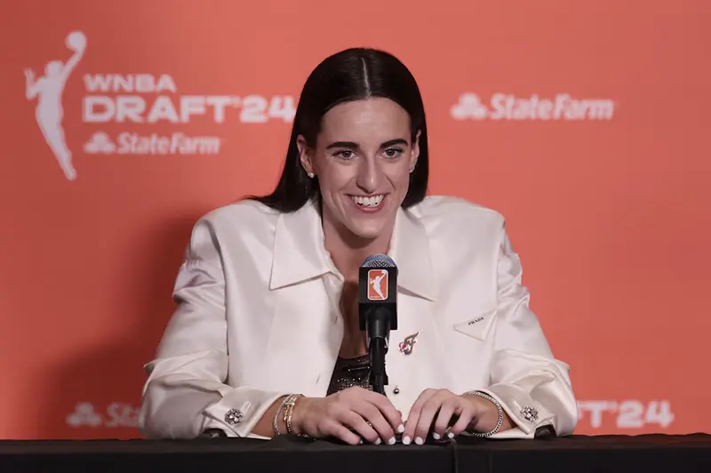 Caitlin Clark speaks in a press conference after she is selected with the number one overall pick to the Indiana Fever n the 2024 WNBA Draft at Brooklyn Academy of Music. Mandatory Credit: Vincent Carchietta-USA TODAY Sports
