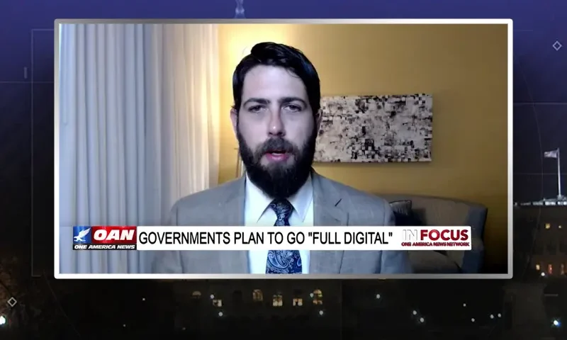 Video still from In Focus on One America News Network during an interview with the guest, Alex Newman.