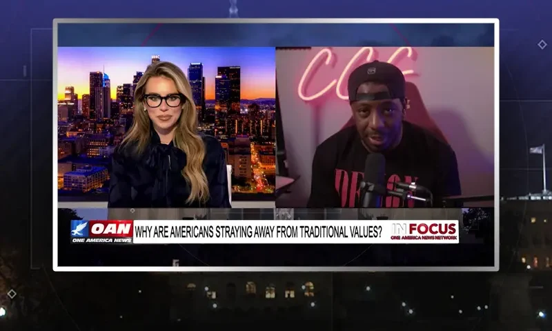 Video still from In Focus on One America News Network showing a split screen of the host on the left side, and on the right side is the guest, Bryson Gray.