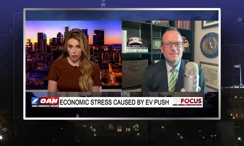Video still from In Focus on One America News Network showing a split screen of the host on the left side, and on the right side is the guest, Jason Isaac.
