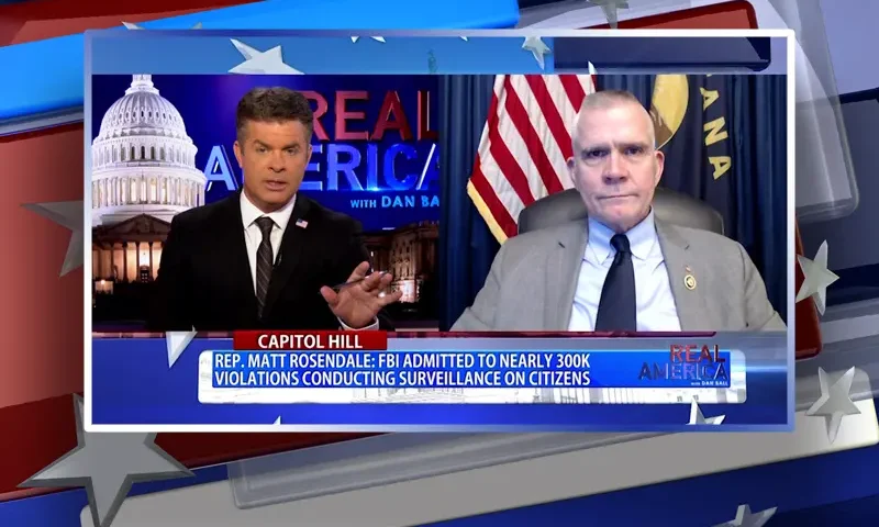 Video still from Real America on One America News Network showing a split screen of the host on the left side, and on the right side is the guest, Rep. Matt Rosendale.