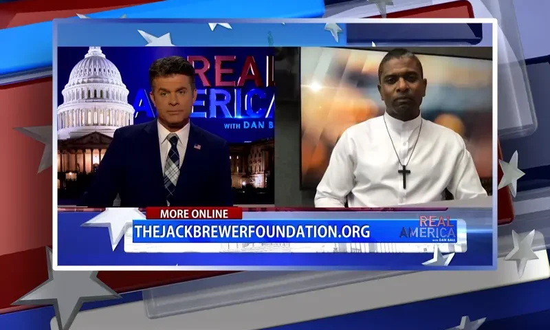 Video still from Real America on One America News Network showing a split screen of the host on the left side, and on the right side is the guest, Jack Brewer.