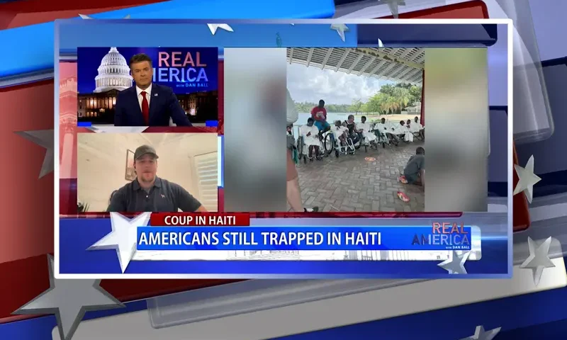Video still from Real America on One America News Network during an interview with the guest, TJ.