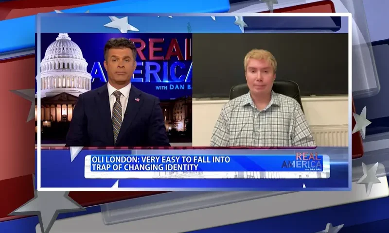 Video still from Real America on One America News Network showing a split screen of the host on the left side, and on the right side is the guest, Oli London.