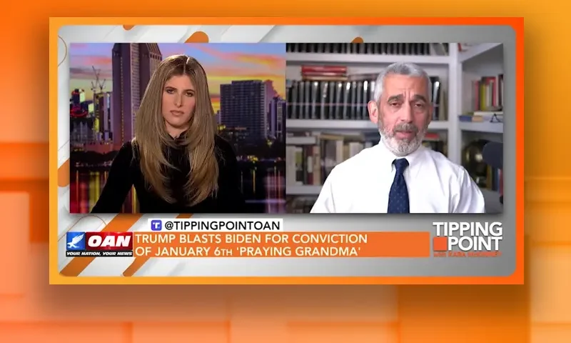 Video still from Tipping Point on One America News Network showing a split screen of the host on the left side, and on the right side is the guest, Lee Smith.