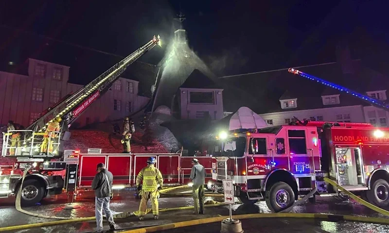 4 of 5 | Firefighters extinguish a fire at Oregon's historic Timberline Lodge, which was featured in Stanley Kubrick's 1980 film "The Shining," Thursday evening, April 18, 2024, in Government Camp, Ore. (Clackamas Fire Department via AP)