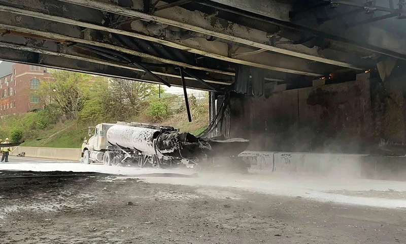 This image provided by the Norwalk Police Department shows the scene of a tanker fire on I-95 in Norwalk, Conn., Thursday, May 2, 2024. Both sides of I-95, the East Coast's main north-south highway, were shut down — causing “horrendous” traffic jams — following the early morning crash involving a passenger car, a tractor-trailer and a tanker truck carrying 8,500 gallons (about 32,000 liters) of gasoline. (Norwalk Police Department via AP)
