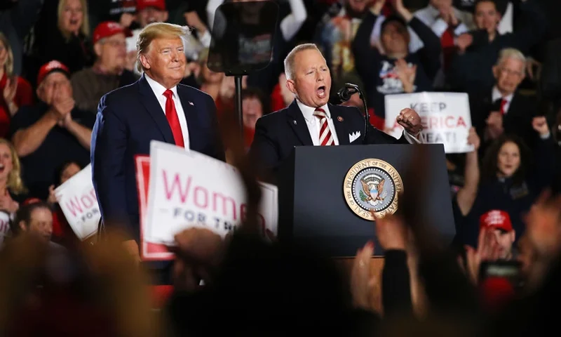 WILDWOOD, NEW JERSEY - JANUARY 28: U.S. Congressman Jeff Van Drew joins President Donald Trump at an evening “Keep America Great Rally” at the Wildwood Convention Center on January 28, 2020 in Wildwood, New Jersey. Trump was in the Southern New Jersey town to show support for Democrat-turned-Republican U.S. Congressman Jeff Van Drew. Some supporters of the president have waited in line since Monday morning. (Photo by Spencer Platt/Getty Images)