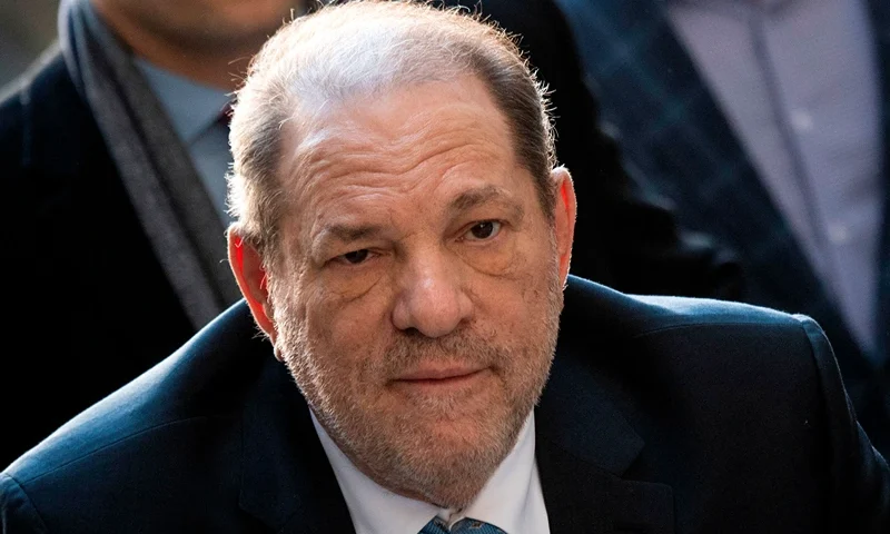 US-ENTERTAINMENT-ASSAULT-TRIAL-WEINSTEIN Harvey Weinstein arrives at the Manhattan Criminal Court, on February 24, 2020 in New York City. - The jury in Harvey Weinstein's rape trial hinted it was struggling to reach agreement on the most serious charge of predatory sexual assault as day four of deliberations ended February 21, 2020 without a verdict. The 12 jurors asked New York state Judge James Burke whether they could be hung on one or both of the top counts but unanimous on the three lesser counts. The disgraced movie mogul, 67, faces life in prison if the jury of seven men and five women convict him of a variety of sexual misconduct charges in New York. (Photo by Johannes EISELE / AFP) (Photo by JOHANNES EISELE/AFP via Getty Images)