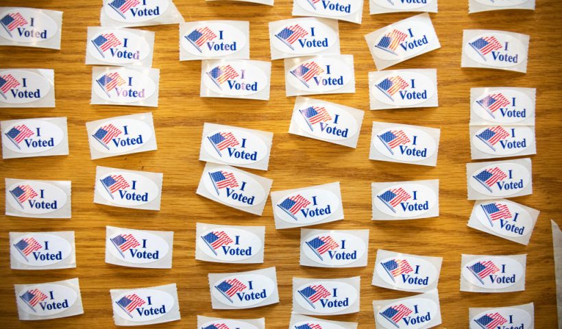 TOPSHOT - "I Voted" stickers cover a table at a polling station during the North Carolina primary on Super Tuesday in Charlotte, North Carolina on March 3, 2020. Forteen states and American Samoa are holding presidential primary elections, with over 1400 delegates at stake. Americans vote Tuesday in primaries that play a major role in who will challenge Donald Trump for the presidency, a day after key endorsements dramatically boosted Joe Biden's hopes against surging leftist Bernie Sanders. The backing of Biden by three of his ex-rivals marked an unprecedented turn in a fractured, often bitter campaign. (Photo by Logan Cyrus / AFP) (Photo by LOGAN CYRUS/AFP via Getty Images)