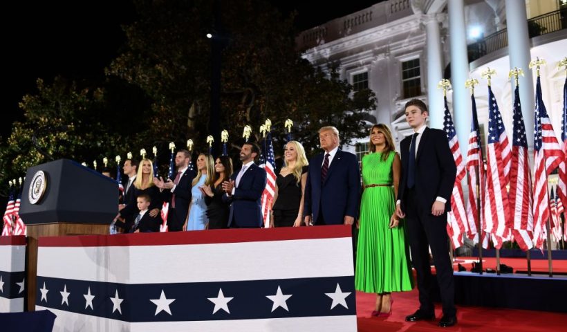 (From R) Barron Trump, First Lady Melania Trump, US President Donald Trump, Tiffany Trump, Donald Trump Jr., Kimberly Guilfoyle, Lara Trump, Eric Trump, Ivanka Trump and Jared Kushner stand after the president delivered his acceptance speech for the Republican Party nomination for reelection during the final day of the Republican National Convention at the South Lawn of the White House in Washington, DC on August 27, 2020. (Photo by Brendan Smialowski / AFP) (Photo by BRENDAN SMIALOWSKI/AFP via Getty Images)