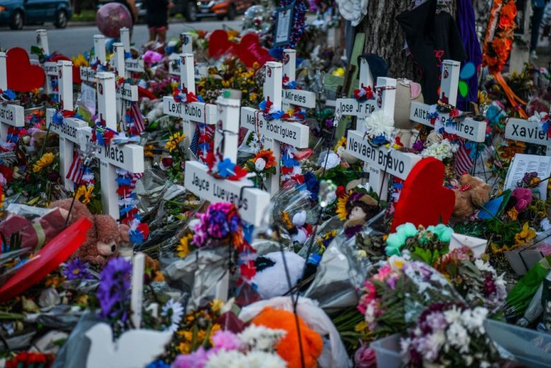 Crosses adorn a makeshift memorial for the victims of the shooting at Robb Elementary School in Uvalde, Texas, on May 31, 2022. - The traumatized Texas town of Uvalde began on Tuesday laying to rest the 19 young children killed in an elementary school shooting that left the small, tight-knit community united in grief and anger. (Photo by CHANDAN KHANNA / AFP) (Photo by CHANDAN KHANNA/AFP via Getty Images)