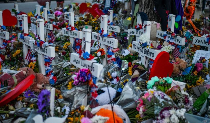 Crosses adorn a makeshift memorial for the victims of the shooting at Robb Elementary School in Uvalde, Texas, on May 31, 2022. - The traumatized Texas town of Uvalde began on Tuesday laying to rest the 19 young children killed in an elementary school shooting that left the small, tight-knit community united in grief and anger. (Photo by CHANDAN KHANNA / AFP) (Photo by CHANDAN KHANNA/AFP via Getty Images)