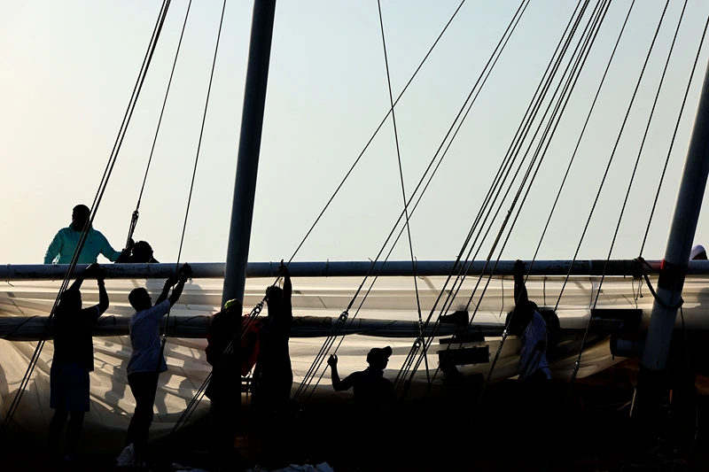 UAE-LIFESTYLE-HERITAGE-TRADITION
Sailors participate in the annual long-distance dhow sailing race, known as al-Gaffal, near Sir Abu Nuair island towards the Gulf emirate of Dubai, on June 3, 2022. - Around Sir Bu Nair, a teardrop-shaped island roughly 100 kilometres (60 miles) away from both Dubai and Abu Dhabi, 118 teams are racing dhows, the sailboats that have plied waters around the Arabian peninsula for centuries. (Photo by Karim SAHIB / AFP) (Photo by KARIM SAHIB/AFP via Getty Images)