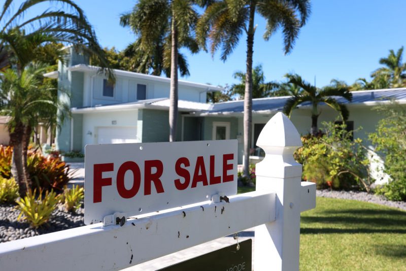 HOLLYWOOD, FLORIDA - OCTOBER 27: A 'For Sale' sign is posted in front of a single family home on October 27, 2022 in Hollywood, Florida. The rate on the average 30-year fixed mortgage hit 7.08%, up from 6.94% the week prior, according to Freddie Mac. Mortgage rates surpassed 7% for the first time since April 2002. (Photo by Joe Raedle/Getty Images)