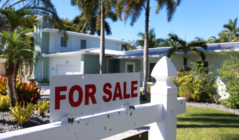 HOLLYWOOD, FLORIDA - OCTOBER 27: A 'For Sale' sign is posted in front of a single family home on October 27, 2022 in Hollywood, Florida. The rate on the average 30-year fixed mortgage hit 7.08%, up from 6.94% the week prior, according to Freddie Mac. Mortgage rates surpassed 7% for the first time since April 2002. (Photo by Joe Raedle/Getty Images)