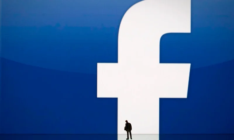 FRANCE-INTERNET-COMPANY-STOCKS-FACEBOOK A picture taken on May 14, 2012 in Paris, shows an illustration made with a figurine set up in front of Facebook's homepage. Facebook, already assured of becoming one of the most valuable US firms when it goes public later this month, now must convince investors in the next two weeks that it is worth all the hype. Top executives at the world's leading social network have kicked off their all-important road show on Wall Street -- an intense marketing drive ahead of the company's expected trading launch on the tech-heavy Nasdaq on May 18. AFP PHOTO/JOEL SAGET (Photo by Joël SAGET / AFP) (Photo credit should read JOEL SAGET/AFP via Getty Images)