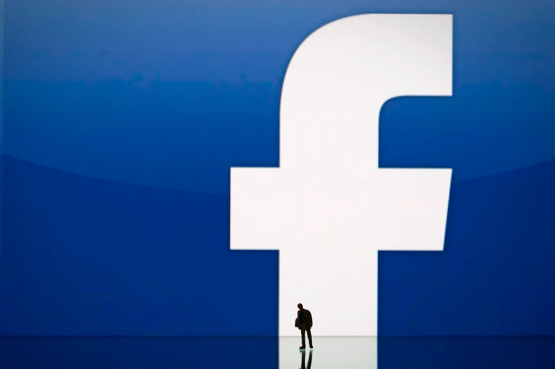 FRANCE-INTERNET-COMPANY-STOCKS-FACEBOOK
A picture taken on May 14, 2012 in Paris, shows an illustration made with a figurine set up in front of Facebook's homepage. Facebook, already assured of becoming one of the most valuable US firms when it goes public later this month, now must convince investors in the next two weeks that it is worth all the hype. Top executives at the world's leading social network have kicked off their all-important road show on Wall Street -- an intense marketing drive ahead of the company's expected trading launch on the tech-heavy Nasdaq on May 18. AFP PHOTO/JOEL SAGET (Photo by Joël SAGET / AFP) (Photo credit should read JOEL SAGET/AFP via Getty Images)