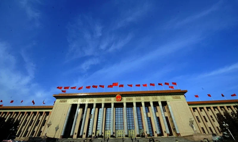 Security personnel prepare for the arrival of delegates at the opening session of the annual National People's Congress (NPC) at the Great Hall of the People in Beijing on March 5, 2010. China's parliament opened its annual session with the Communist Party expected to reassure the people it can bridge a widening rich-poor gap and keep the world's third-largest economy on track. AFP PHOTO/GOH CHAI HIN (Photo by AFP) (Photo by -/AFP via Getty Images)