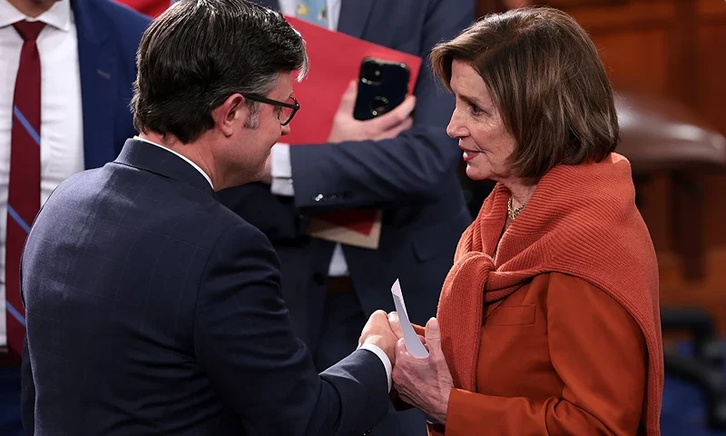 WASHINGTON, DC - OCTOBER 25: Former U.S. Speaker of the House Nancy Pelosi (D-CA) talks to newly elected Speaker of the House Mike Johnson (R-LA) after the House of Representatives held an election at the U.S. Capitol on October 25, 2023 in Washington, DC. After a contentious nominating period that has seen four candidates over a three-week period, Johnson was voted in to succeed former Speaker Kevin McCarthy (R-CA), who was ousted on October 4 in a move led by a small group of conservative members of his own party. (Photo by Win McNamee/Getty Images)
