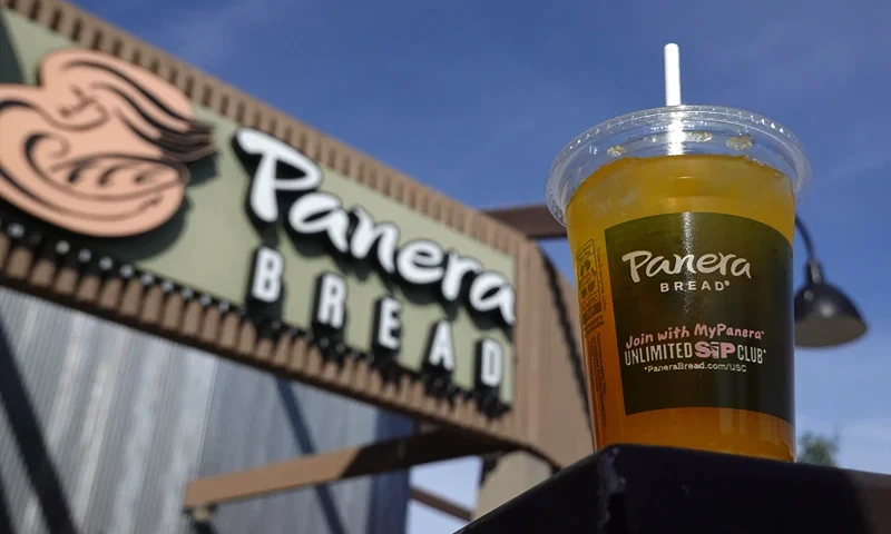 Panera Bread To Layoff 17 Percent Of Executives NOVATO, CALIFORNIA - NOVEMBER 01: In this photo illustration, a Panera Bread mango yuzu citrus charged lemonade is displayed at a Panera Bread restaurant on November 01, 2023 in Novato, California. Missouri based Panera Bread announced plans to lay off 17 percent of its 1800 corporate staff as the company streamlines its operations ahead of an initial public offering. (Photo illustration by Justin Sullivan/Getty Images)