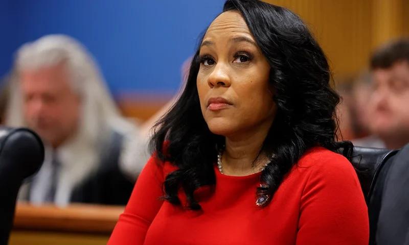 US-JUSTICE-POLITICS-TRUMP-GEORGIA Fulton County District Attorney Fani Willis arrives for the final arguments in her disqualification hearing at the Fulton County Courthouse on March 1, 2024, in Atlanta, Georgia. Fulton County Superior Judge Scott McAfee is considering a motion to disqualify Willis over her romantic relationship with Special Prosecutor Nathan Wade, whom she appointed as special prosecutor in the election interference charges against former president Donald Trump. (Photo by Alex Slitz / POOL / AFP) (Photo by ALEX SLITZ/POOL/AFP via Getty Images)