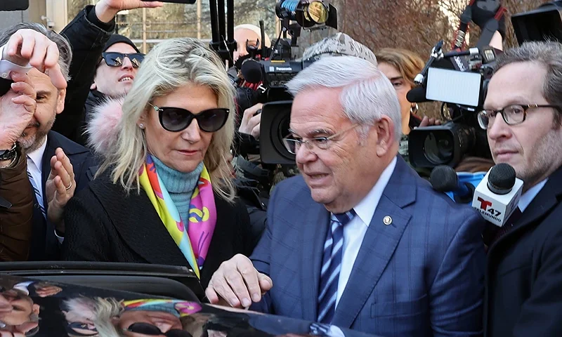 NEW YORK, NEW YORK - MARCH 11: (EDITOR'S NOTE: Alternate crop) Senator Bob Menendez (D-NJ) and his wife Nadine Menendez depart a Manhattan court following an arraignment on new charges in the federal bribery case against them on March 11, 2024 in New York City. Menendez and his wife are accused of taking bribes of gold bars, a luxury car and cash in exchange for using Menendez's position to help the government of Egypt and other corrupt acts according to an indictment from SDNY. The indictment is the second in eight years against Menendez. The indictment also includes charges for Wael Hana, Jose Uribe, and Fred Daibes. (Photo by Spencer Platt/Getty Images)