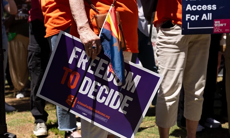 Arizona's Supreme Court Revives 1864 Law Banning Abortions, Causing Backlash PHOENIX, ARIZONA - APRIL 17: Members of Arizona for Abortion Access, the ballot initiative to enshrine abortion rights in the Arizona State Constitution, hold a press conference and protest condemning Arizona House Republicans and the 1864 abortion ban during a recess from a legislative session at the Arizona House of Representatives on April 17, 2024 in Phoenix, Arizona. Arizona House Republicans blocked the Democrats from holding a vote to overturn the 1864 abortion ban revived last week by the Arizona Supreme Court. (Photo by Rebecca Noble/Getty Images)
