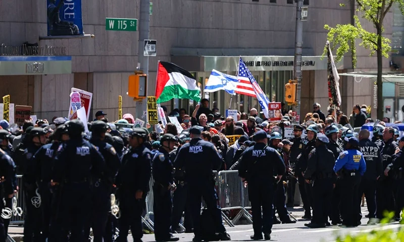 Pro-Palestinian and Pro-israel face off outside of Columbia University which is occupied by Pro-Palestinian protesters in New York on April 22, 2024. US President Joe Biden condemned any anti-Semitism on college campuses April April 21, 2024 as pro-Palestinian protesters at Columbia University spent their fifth day demanding the school sever financial ties with key US ally Israel. (Photo by CHARLY TRIBALLEAU / AFP) (Photo by CHARLY TRIBALLEAU/AFP via Getty Images)