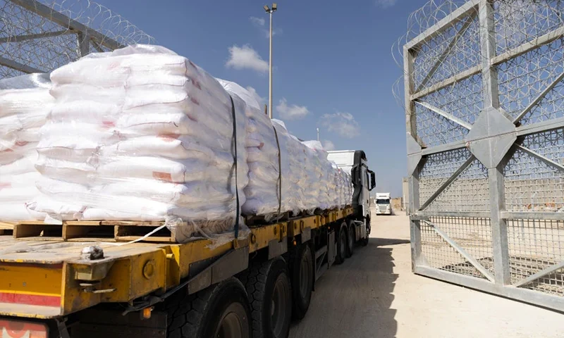 EREZ CROSSING POINT, ISRAEL - MAY 5: A truck makes its way into the Gaza Strip as it is carrying humanitarian aid during a press tour of the Erez Crossing organized by the Israel Defense Forces on May 5, 2024 in Erez Crossing Point, Israel. Earlier this week, Israel reopened the Erez Crossing to allow more aid shipments to reach Gaza, whose population is experiencing widespread hunger after nearly seven months of war. The Erez Crossing was the principal route between Israel and Gaza prior to the Hamas-led attack on Oct. 7 and it had remained closed to traffic since. (Photo by Amir Levy/Getty Images)
