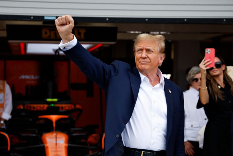 MIAMI, FLORIDA - MAY 05: Donald Trump gestures in the Pitlane prior to the F1 Grand Prix of Miami at Miami International Autodrome on May 05, 2024 in Miami, Florida. (Photo by Chris Graythen/Getty Images)