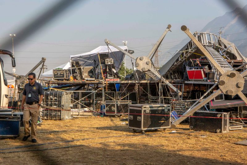 A member of forensic services inspects the area where a stage collapsed the day before during a campaign rally for Mexican presidential candidate Jorge Alvarez Maynez in San Pedro Garza Garcia, Nuevo Leon, Mexico, on May 22, 2024. An election rally in northern Mexico descended into tragedy after a gust of wind sent the stage careening into the crowd on Wednesday night, killing at least nine people, including a child, authorities said. At least 78 other people were injured in the accident, some seriously, according to Nuevo Leon Governor Samuel Garcia. (Photo by Julio Cesar AGUILAR / AFP) (Photo by JULIO CESAR AGUILAR/AFP via Getty Images)