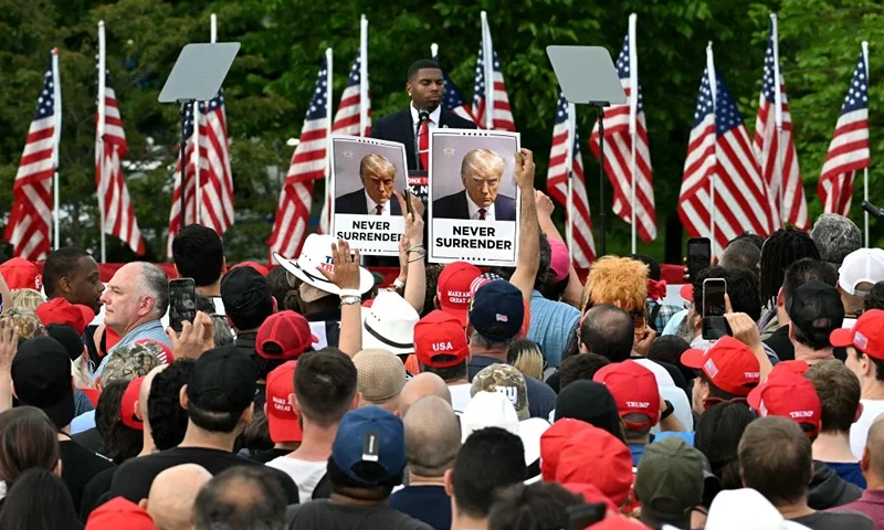 Supporters of former US President Donald Trump attend a campaign rally at Crotona Park in the South Bronx, New York City on May 23, 2024. (Photo by Jim WATSON / AFP) (Photo by JIM WATSON/AFP via Getty Images)