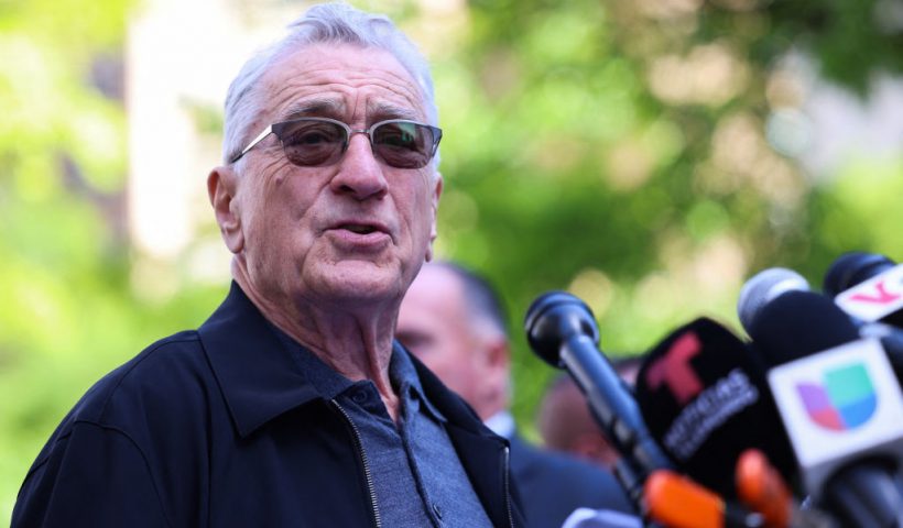 US actor Robert De Niro speaks in support of US President Joe Biden outside of Manhattan Criminal Court as former US President and Republican presidential candidate Donald Trump attends his criminal trial for allegedly covering up hush money payments in New York City, on May 28, 2024. De Niro on Tuesday spoke outside the New York court where Donald Trump is standing trial, branding him a dangerous "clown" who will become a dictator for life if reelected. De Niro, a longtime political activist and critic of Trump, has taken a growing role in the campaign to reelect Joe Biden, including starring in a new hard-hitting TV ad for the Democratic Party. (Photo by Charly TRIBALLEAU / AFP) (Photo by CHARLY TRIBALLEAU/AFP via Getty Images)