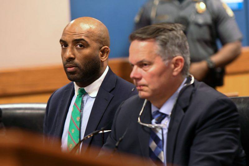 ATLANTA, GEORGIA - MAY 28: Defendant Harrison Floyd with attorney Christopher Kachouroff in court during a hearing at the Fulton County Courthouse on May 28, 2024 in Atlanta, Georgia. Trump's legal team sought to dismiss the Georgia election lawsuit on the basis of First Amendment rights. (Photo by Dennis Byron-Pool/Getty Images)