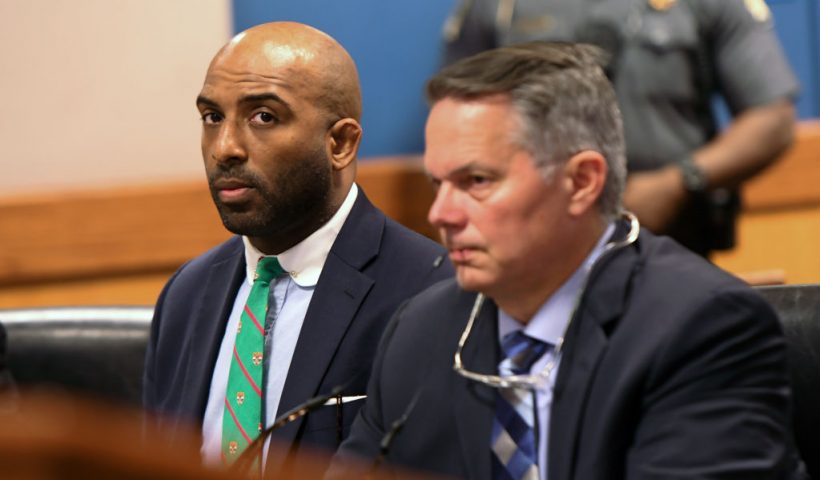 ATLANTA, GEORGIA - MAY 28: Defendant Harrison Floyd with attorney Christopher Kachouroff in court during a hearing at the Fulton County Courthouse on May 28, 2024 in Atlanta, Georgia. Trump's legal team sought to dismiss the Georgia election lawsuit on the basis of First Amendment rights. (Photo by Dennis Byron-Pool/Getty Images)
