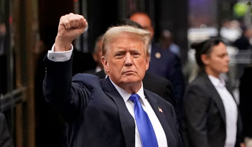 Former US President and Republican presidential candidate Donald Trump holds up a fist as he arrives back at Trump Tower after being convicted in his criminal trial in New York City, on May 30, 2024. A panel of 12 New Yorkers were unanimous in their determination that Donald Trump is guilty as charged -- but for the impact on his election prospects, the jury is still out. The Republican billionaire was convicted of all 34 charges in New York on May 30, 2024, and now finds himself bidding for a second presidential term unsure if he'll be spending 2025 in the Oval Office, on probation or in jail. (Photo by TIMOTHY A. CLARY / AFP) (Photo by TIMOTHY A. CLARY/AFP via Getty Images)