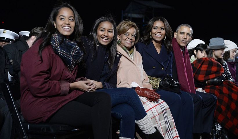 WASHINGTON, DC - DECEMBER 02: Malia Obama, Sasha Obama, mother-in-law Marian Robinson, first lady Michelle Obama and President Barack Obama attend the national Christmas tree lighting ceremony on the Ellipse south of the White House December 3, 2015 in Washington, DC. The lighting of the tree is an annual tradition attended by the president and the first family. (Photo by Olivier Douliery- Pool/Getty Images)
