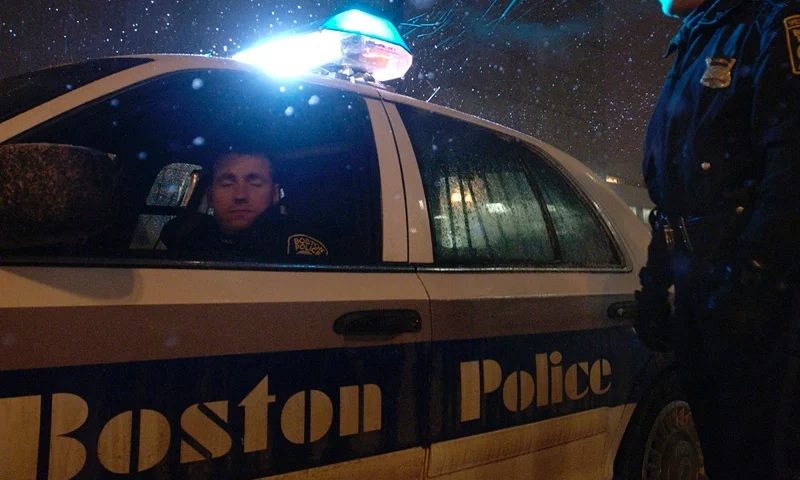 BOSTON - JANUARY 19: Boston Police officers Dennis Murphy (L) and Billy Cloran (R) patrol outside the South Station train station during an alert for a possible terror threat January 19, 2005 in Boston, Massachusetts. Federal agents have told local Massachusetts authorities that four people wanted for questioning in connection with a possible terrorist threat may have illegally entered the U.S. from Mexico, headed for Boston. (Photo by Jodi Hilton/Getty Images)