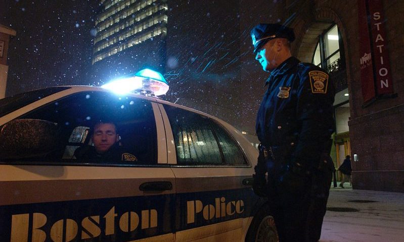 BOSTON - JANUARY 19: Boston Police officers Dennis Murphy (L) and Billy Cloran (R) patrol outside the South Station train station during an alert for a possible terror threat January 19, 2005 in Boston, Massachusetts. Federal agents have told local Massachusetts authorities that four people wanted for questioning in connection with a possible terrorist threat may have illegally entered the U.S. from Mexico, headed for Boston. (Photo by Jodi Hilton/Getty Images)
