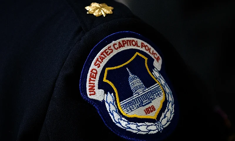 WASHINGTON, DC - MAY 9: A view of a U.S. Capitol Police badge on a uniform as officers wait for the start of an annual memorial service in honor of the four U.S. Capitol Police officers who have died in the line of duty, at the U.S. Capitol, May 9, 2016, in Washington, DC. Sgt. Clinton Holtz (2014), Detective John Gibson (1998), Officer Jacob Chestnut (1998) and Sgt. Christopher Eney (1984) are the four members of the U.S. Capitol Police who have lost their lives while on duty. (Photo by Drew Angerer/Getty Images)
