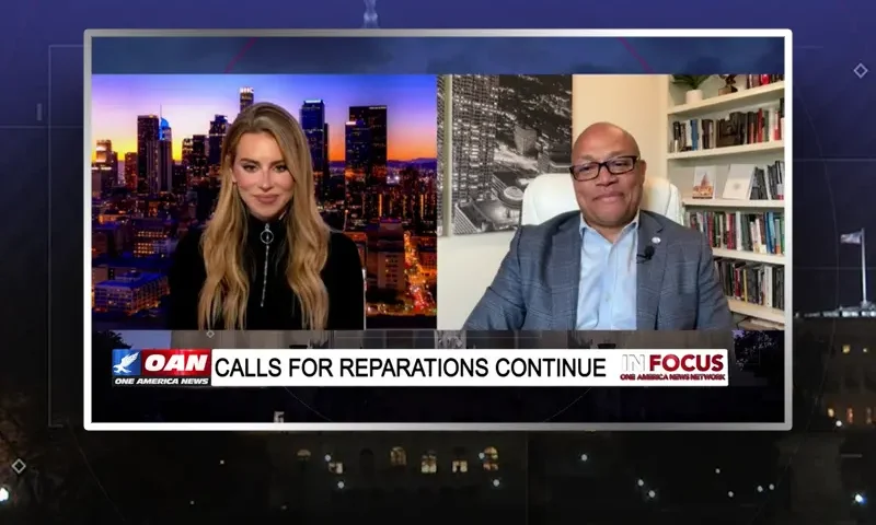 Video still from In Focus on One America News Network showing a split screen of the host on the left side, and on the right side is the guest, Virgil Walker.