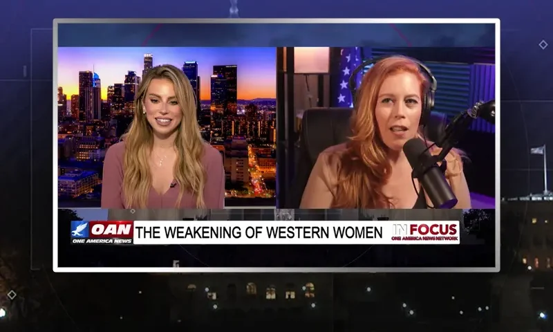 Video still from In Focus on One America News Network showing a split screen of the host on the left side, and on the right side is the guest, Chrissie Mayr.
