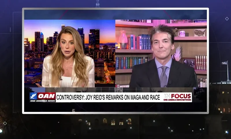 Video still from In Focus on One America News Network showing a split screen of the host on the left side, and on the right side is the guest, Eric Scheiner.
