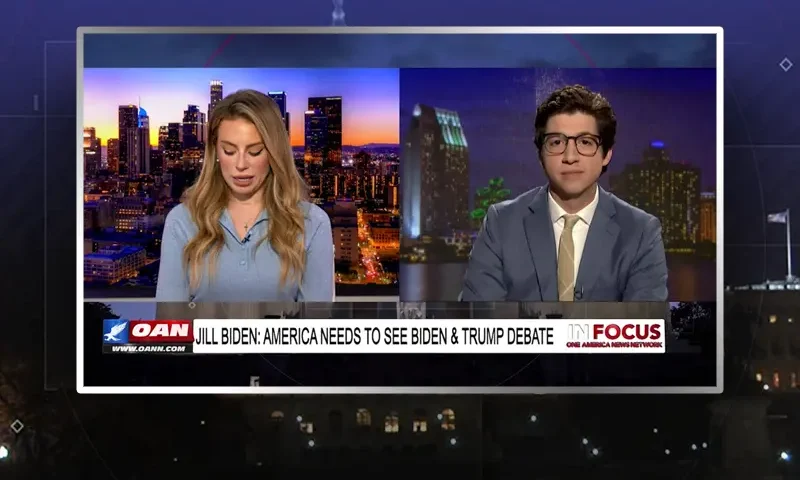 Video still from In Focus on One America News Network showing a split screen of the host on the left side, and on the right side is the guest, Chris Boyle.