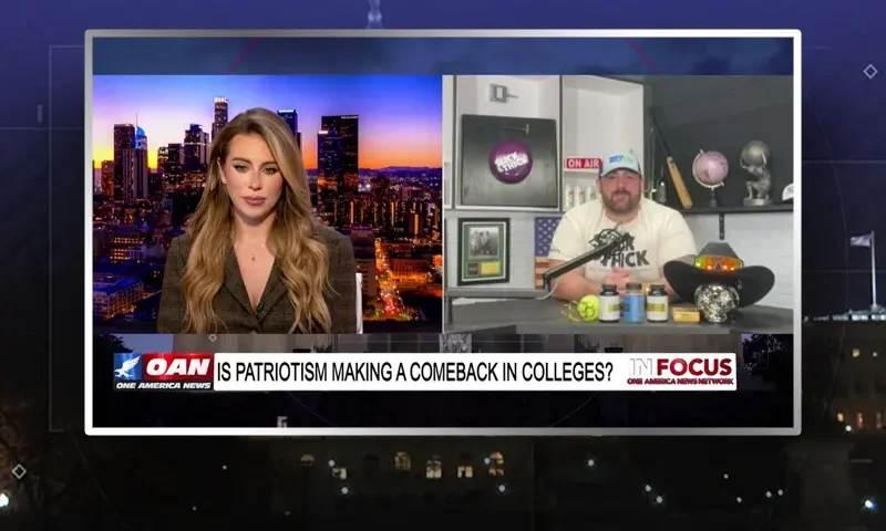 Video still from In Focus on One America News Network showing a split screen of the host on the left side, and on the right side is the guest, Gerard Michaels.