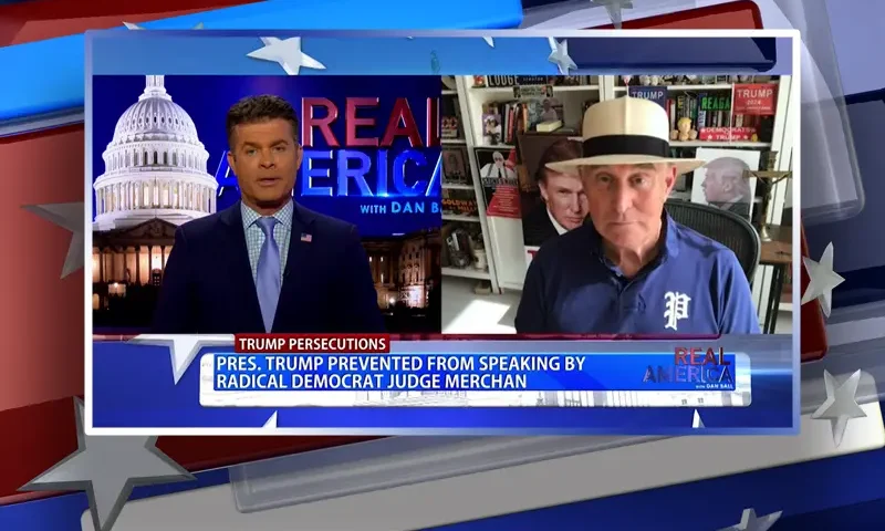 Video still from Real America on One America News Network showing a split screen of the host on the left side, and on the right side is the guest, Roger Stone.